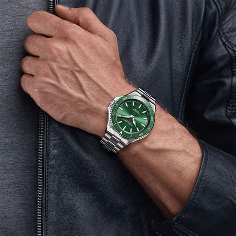 green expensive watch.